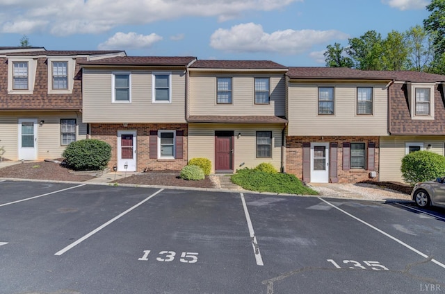 8108 Timberlake Rd Unit 135, Lynchburg, VA 24502 - townhome / multi-family property with uncovered parking and brick siding