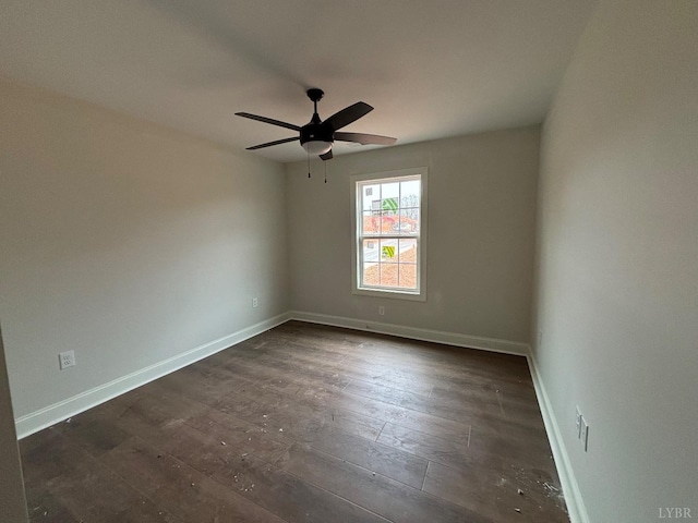 1026 Misty Mountain Rd, Lynchburg, VA 24502 - empty room featuring dark wood-style floors, a ceiling fan, and baseboards