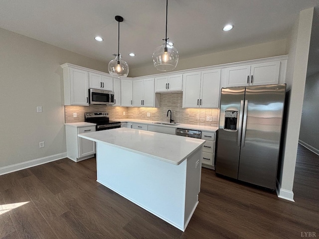 536 Leesville Rd Unit 301, Lynchburg, VA 24502 - kitchen featuring appliances with stainless steel finishes, dark wood-style floors, a center island, white cabinetry, and recessed lighting