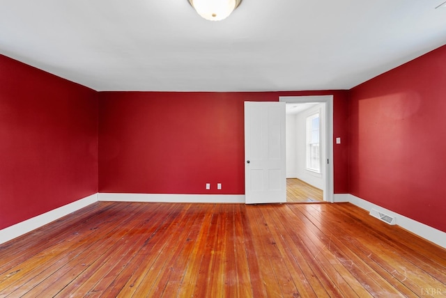 281 Calohan Rd, Rustburg, VA 24588 - spare room featuring baseboards, visible vents, and hardwood / wood-style flooring