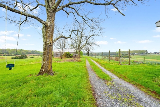281 Calohan Rd, Rustburg, VA 24588 - view of yard featuring fence, driveway, and a rural view