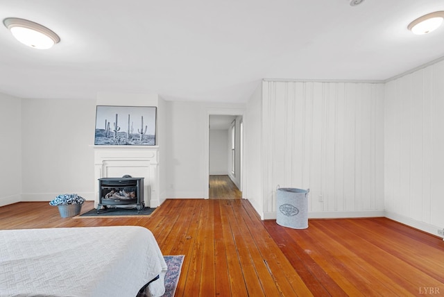 281 Calohan Rd, Rustburg, VA 24588 - bedroom featuring hardwood / wood-style flooring, baseboards, and a fireplace