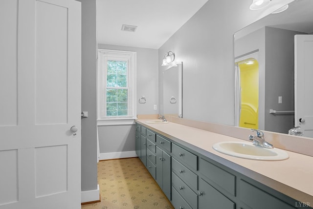 281 Calohan Rd, Rustburg, VA 24588 - bathroom featuring a sink, visible vents, tile patterned floors, and baseboards