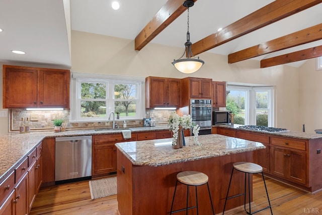 281 Calohan Rd, Rustburg, VA 24588 - kitchen featuring a sink, a peninsula, appliances with stainless steel finishes, a kitchen island, and recessed lighting