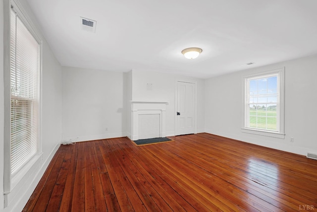 281 Calohan Rd, Rustburg, VA 24588 - unfurnished living room featuring visible vents, hardwood / wood-style flooring, and baseboards