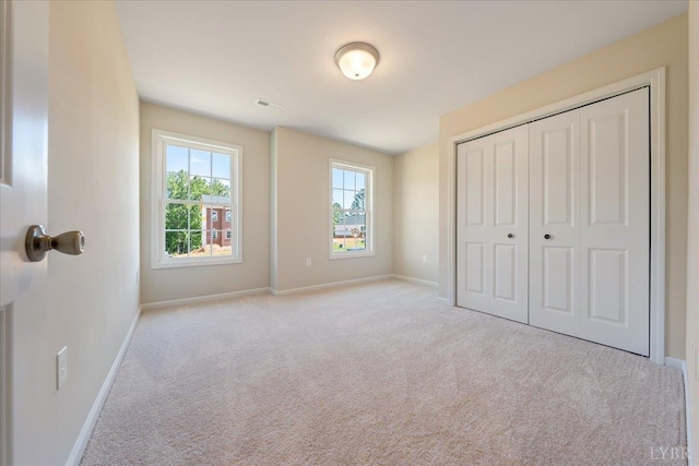 22 Lochwood Hill Dr, Goode, VA 24556 - unfurnished bedroom featuring carpet flooring, baseboards, and a closet