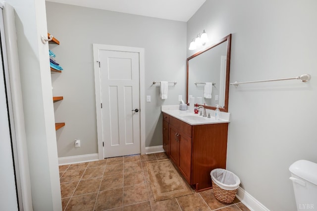 1310 Whispering Springs Ct, Forest, VA 24551 - bathroom with vanity, baseboards, and toilet