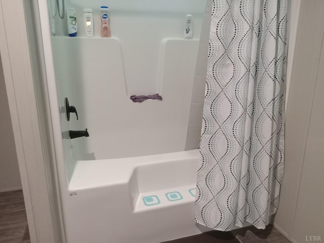 839 Cedar Gate Rd, Monroe, VA 24574 - full bathroom with shower / bath combo with shower curtain and wood finished floors