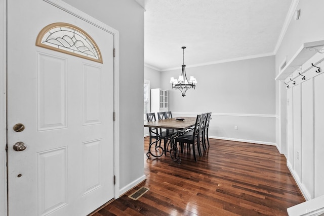 5712 Cottontown Rd, Forest, VA 24551 - entryway featuring crown molding, dark wood-style floors, a chandelier, and baseboards