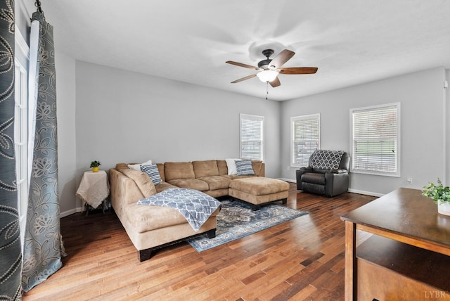 5712 Cottontown Rd, Forest, VA 24551 - living room featuring ceiling fan, wood finished floors, and baseboards