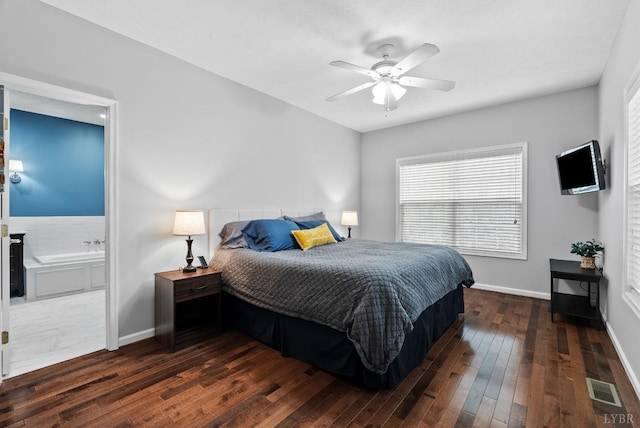 5712 Cottontown Rd, Forest, VA 24551 - bedroom with dark wood finished floors, baseboards, multiple windows, and connected bathroom