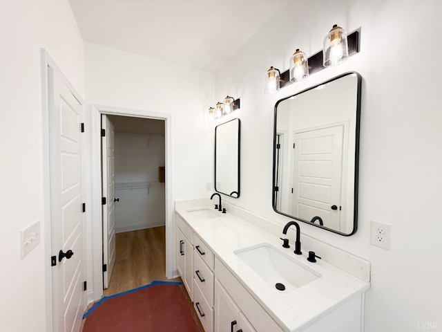 1417 Floyd St, Lynchburg, VA 24502 - full bathroom featuring double vanity, wood finished floors, and a sink