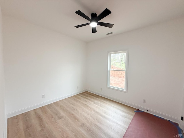 1417 Floyd St, Lynchburg, VA 24502 - unfurnished room featuring baseboards, a ceiling fan, wood finished floors, and visible vents
