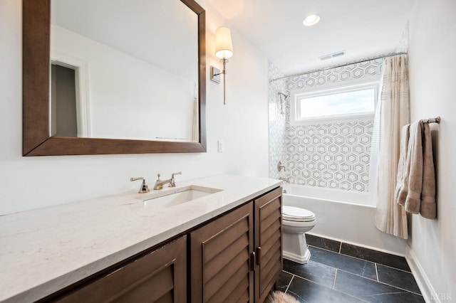 bathroom featuring shower / bathing tub combination, toilet, vanity, visible vents, and baseboards