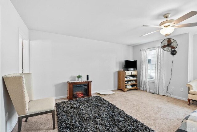255 Traverse Dr, Evington, VA 24550 - bedroom featuring carpet flooring, baseboards, a glass covered fireplace, and ceiling fan