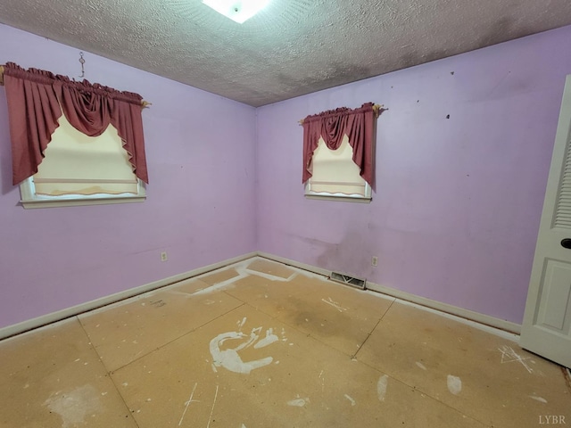 1418 Mitchell Rd, Chatham, VA 24531 - empty room with baseboards and a textured ceiling