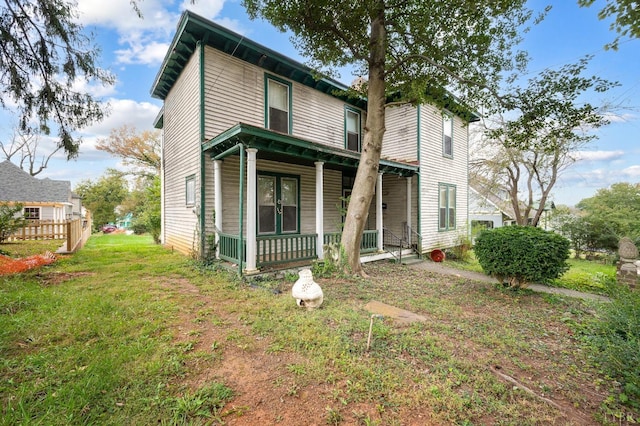 119 Harrison St, Lynchburg, VA 24504 - back of property with a lawn and covered porch