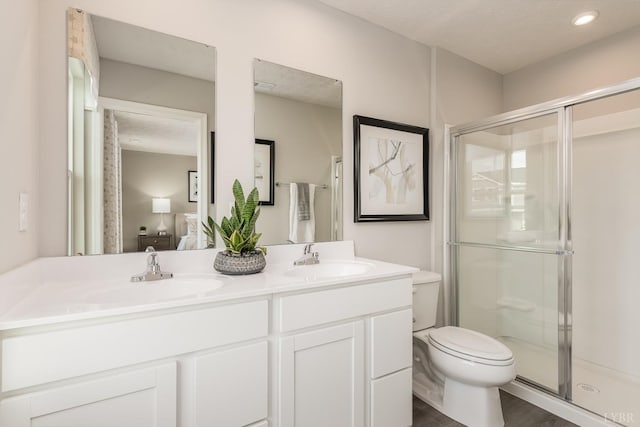 84 Kade Ct, Lynchburg, VA 24502 - ensuite bathroom with a shower stall, toilet, and double vanity