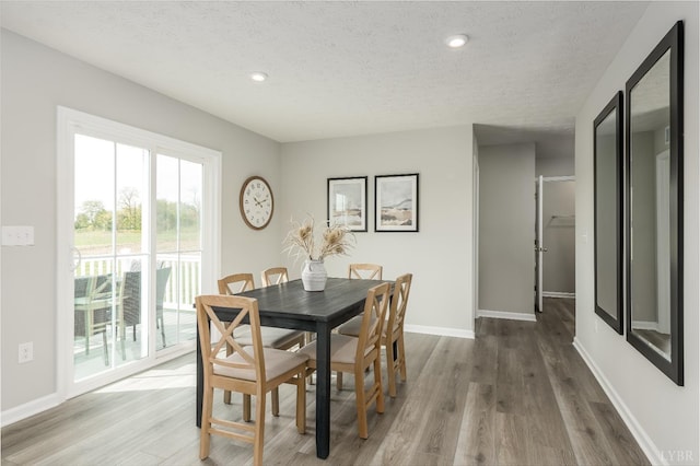 84 Kade Ct, Lynchburg, VA 24502 - dining space featuring a textured ceiling, wood finished floors, baseboards, and recessed lighting