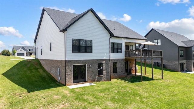 1033 Elk Creek Rd, Forest, VA 24551 - back of house featuring brick siding, a yard, french doors, and a deck