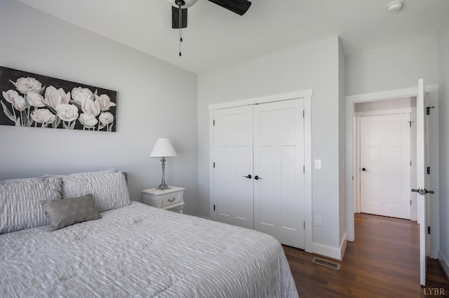 1033 Elk Creek Rd, Forest, VA 24551 - bedroom with dark wood finished floors, a closet, baseboards, and ceiling fan