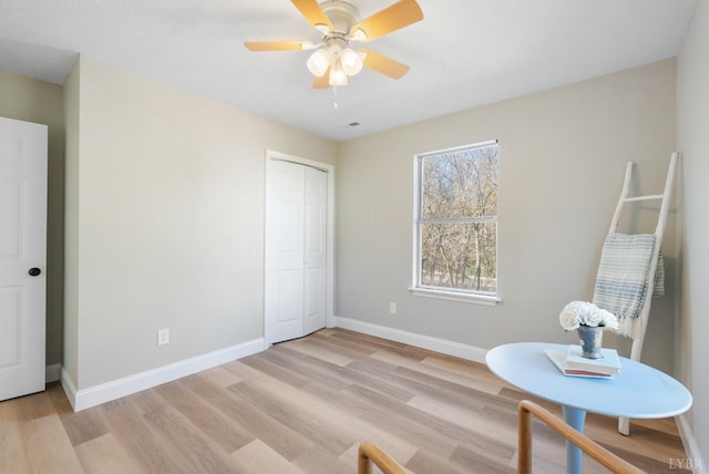 442 W King St, Bedford, VA 24523 - sitting room with light wood-style flooring, baseboards, and ceiling fan