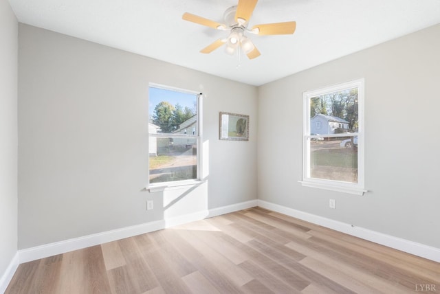 442 W King St, Bedford, VA 24523 - unfurnished room featuring ceiling fan, baseboards, and wood finished floors