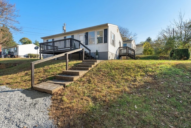 442 W King St, Bedford, VA 24523 - view of front of home with a wooden deck, stairs, and a front lawn