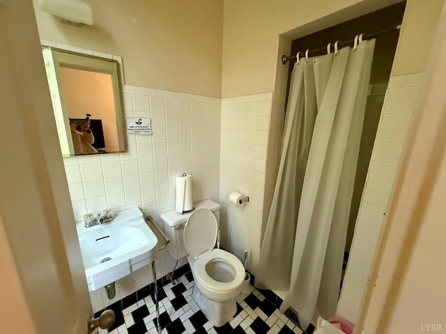2134 Westerly Dr, Lynchburg, VA 24501 - full bathroom with a shower with shower curtain, tile walls, toilet, and a sink
