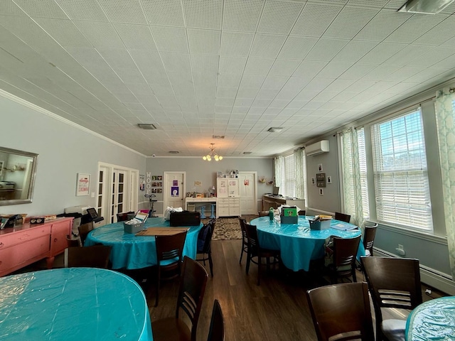 2134 Westerly Dr, Lynchburg, VA 24501 - dining space with an AC wall unit, crown molding, wood finished floors, an inviting chandelier, and french doors