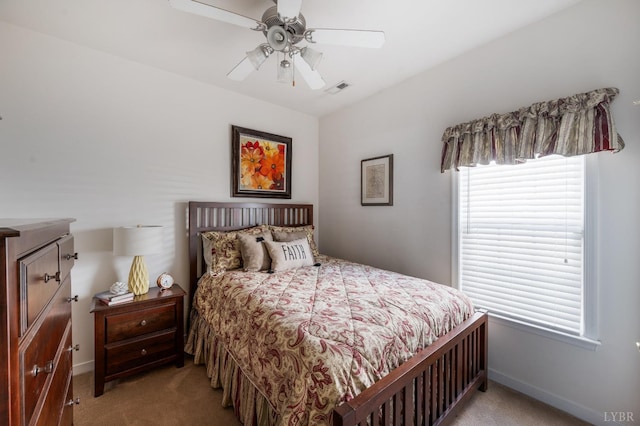 328 Paulette Cir, Lynchburg, VA 24502 - bedroom with carpet, multiple windows, a ceiling fan, and baseboards