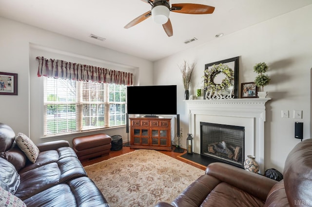 328 Paulette Cir, Lynchburg, VA 24502 - living room featuring wood finished floors, a ceiling fan, and a fireplace with flush hearth