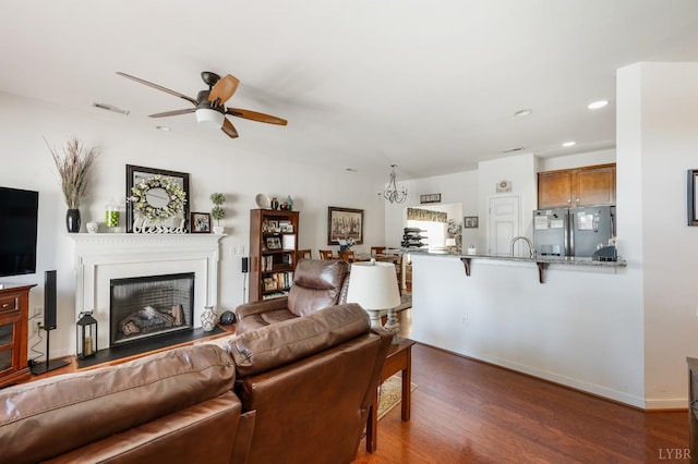 328 Paulette Cir, Lynchburg, VA 24502 - living room with ceiling fan, dark wood-style flooring, recessed lighting, a fireplace, and baseboards