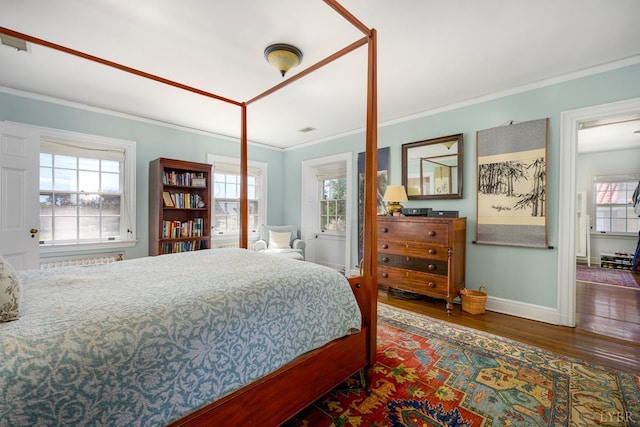 3830 Peakland Pl, Lynchburg, VA 24503 - bedroom featuring multiple windows, wood finished floors, baseboards, and ornamental molding