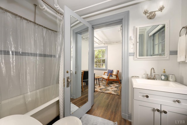 3830 Peakland Pl, Lynchburg, VA 24503 - bathroom featuring toilet, shower / tub combo with curtain, vanity, and wood finished floors