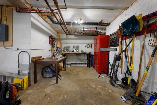 3830 Peakland Pl, Lynchburg, VA 24503 - below grade area with electric panel, a workshop area, and a garage