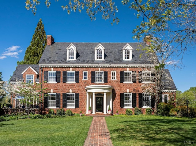 3830 Peakland Pl, Lynchburg, VA 24503 - colonial inspired home with brick siding, a chimney, and a front yard