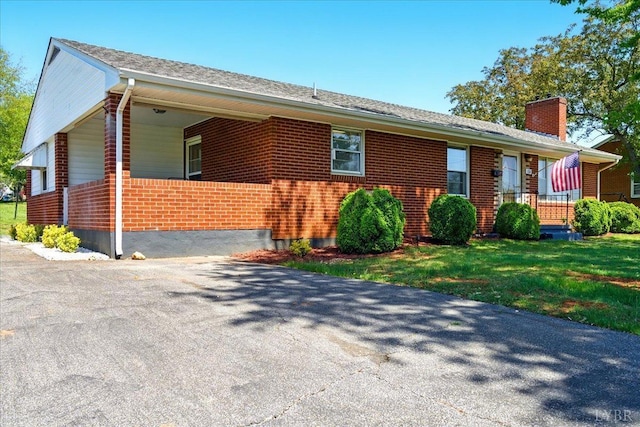 1321 Norfolk Ave, Bedford, VA 24523 - view of side of property with brick siding, a chimney, and a porch