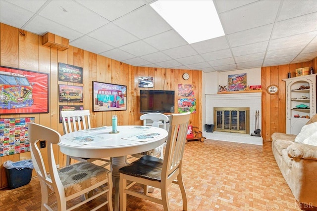1321 Norfolk Ave, Bedford, VA 24523 - dining area with wooden walls, a drop ceiling, and a fireplace