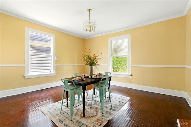702 Dinwiddie St, Lynchburg, VA 24504 - dining space with a chandelier, wood-type flooring, baseboards, and ornamental molding
