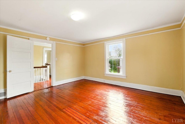 702 Dinwiddie St, Lynchburg, VA 24504 - spare room with hardwood / wood-style floors, baseboards, and ornamental molding