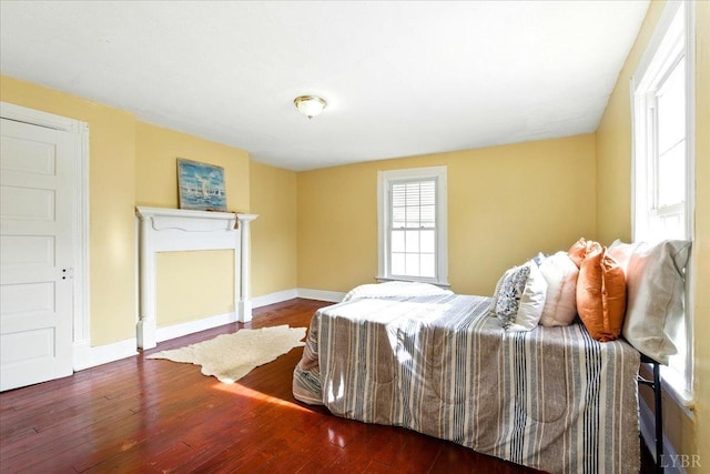 702 Dinwiddie St, Lynchburg, VA 24504 - bedroom featuring dark wood-style floors and baseboards