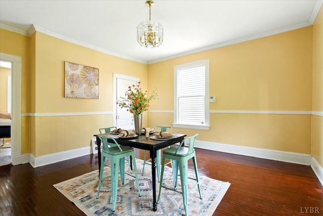 702 Dinwiddie St, Lynchburg, VA 24504 - dining area featuring hardwood / wood-style flooring, a chandelier, baseboards, and crown molding