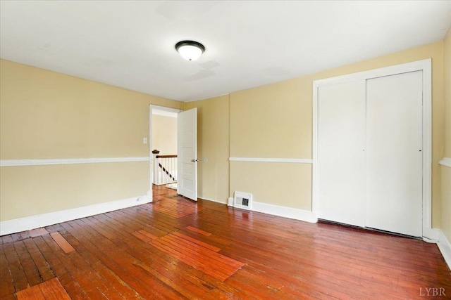702 Dinwiddie St, Lynchburg, VA 24504 - spare room featuring hardwood / wood-style floors and baseboards