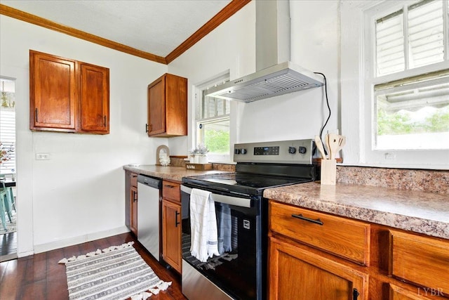 702 Dinwiddie St, Lynchburg, VA 24504 - kitchen featuring stainless steel appliances, wall chimney exhaust hood, crown molding, brown cabinetry, and dark wood-style flooring