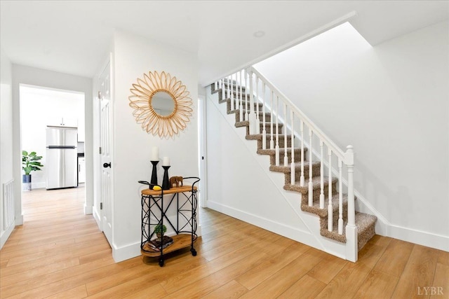 17 Beverly St, Lynchburg, VA 24501 - stairs featuring wood finished floors and baseboards