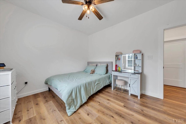 9900 Stonewall Rd, Appomattox, VA 24522 - bedroom with light wood-style flooring, baseboards, and ceiling fan
