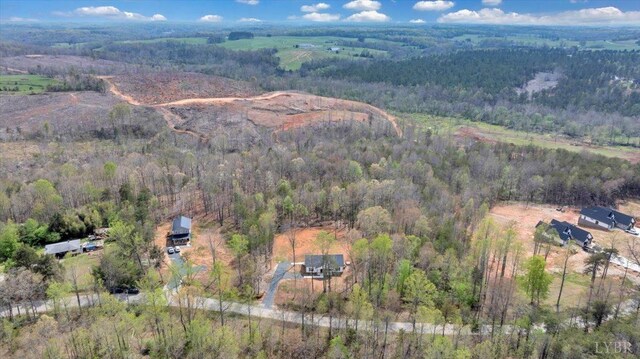 9900 Stonewall Rd, Appomattox, VA 24522 - drone / aerial view featuring a wooded view