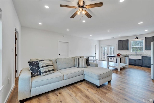 9900 Stonewall Rd, Appomattox, VA 24522 - living area with light wood-type flooring, french doors, recessed lighting, and a ceiling fan