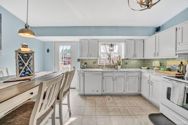 3783 Praline Pl, Roanoke, VA 24012 - kitchen with white appliances, a sink, decorative backsplash, white cabinets, and hanging light fixtures